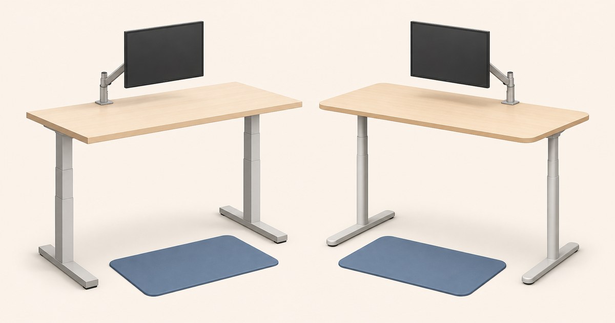 Two light-wood standing desks with monitor arms and blue floor mats are shown side by side for an ergonomic desk comparison.